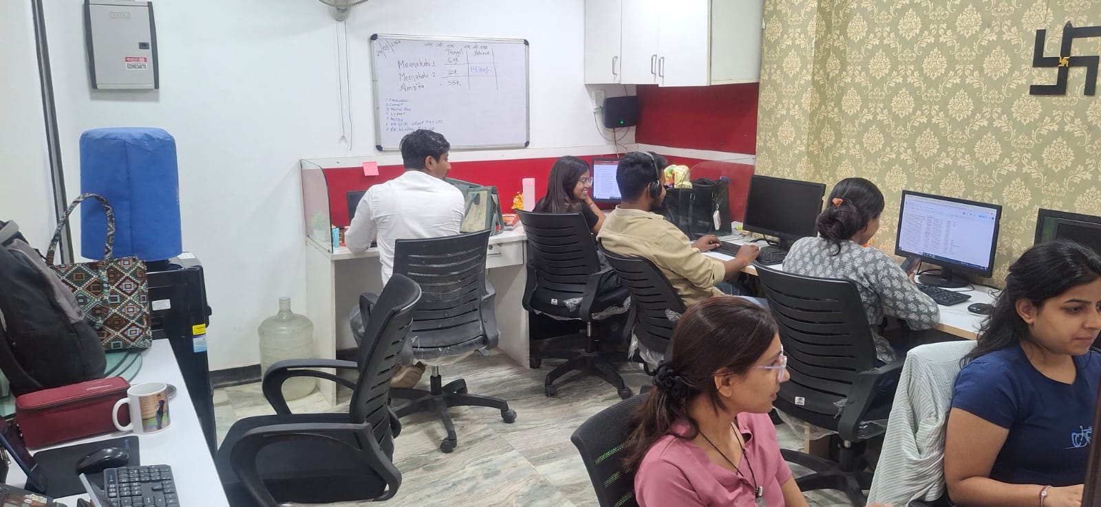 Team members handling seller catalogues and account management
